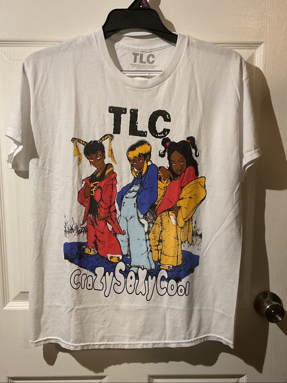 TLC Cartoon Style White Graphic Band Tee with Red, Blue & Yellow Artwork